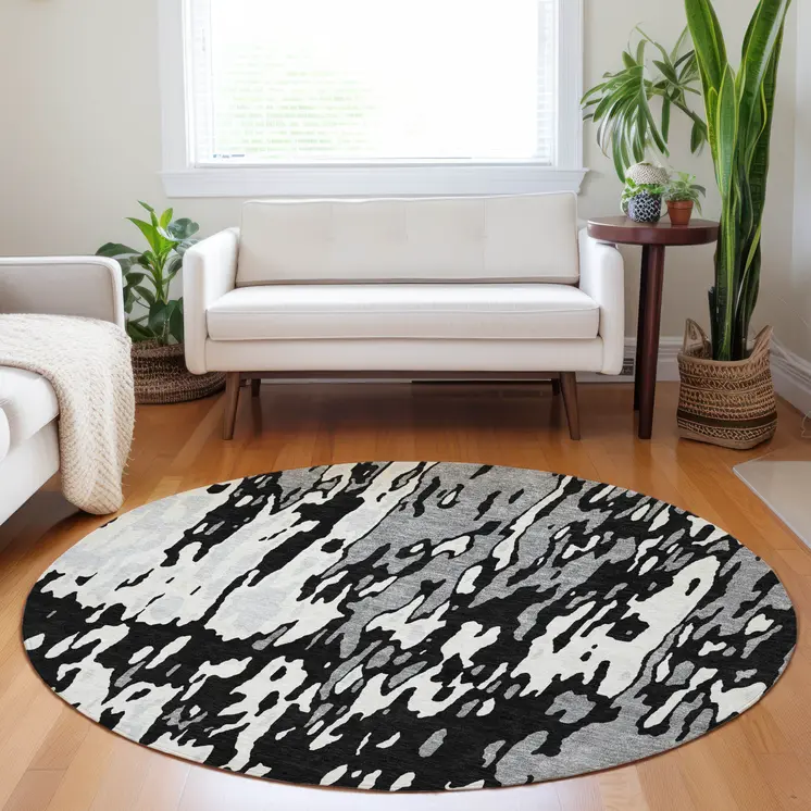 8' Black And Ivory Round Abstract Washable Indoor Outdoor Area Rug