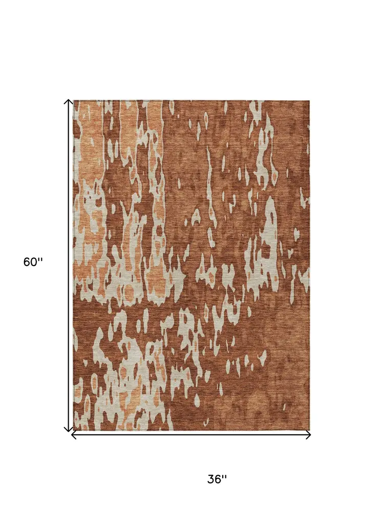 3' X 5' Orange And Ivory Abstract Washable Indoor Outdoor Area Rug
