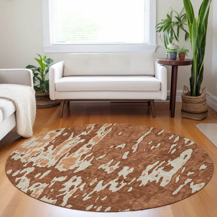 8' Orange And Ivory Round Abstract Washable Indoor Outdoor Area Rug