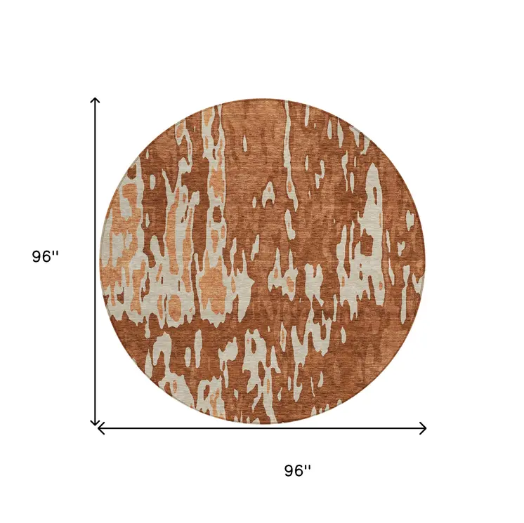 8' Orange And Ivory Round Abstract Washable Indoor Outdoor Area Rug
