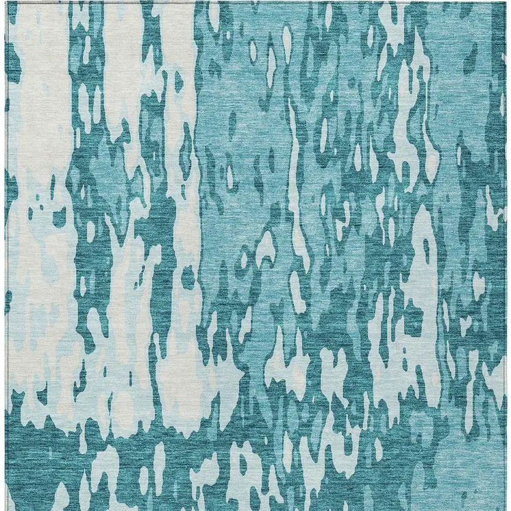 10' X 14' Teal Blue And Ivory Abstract Washable Indoor Outdoor Area Rug
