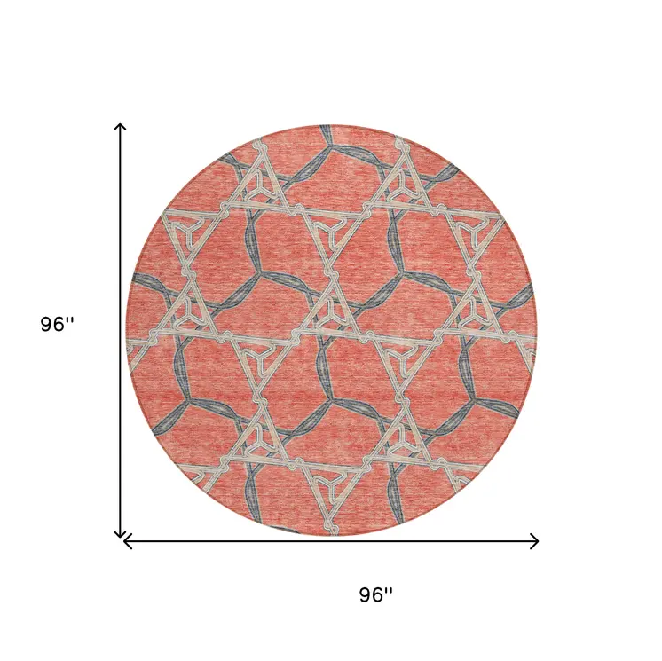 8' Coral And Taupe Round Geometric Washable Indoor Outdoor Area Rug