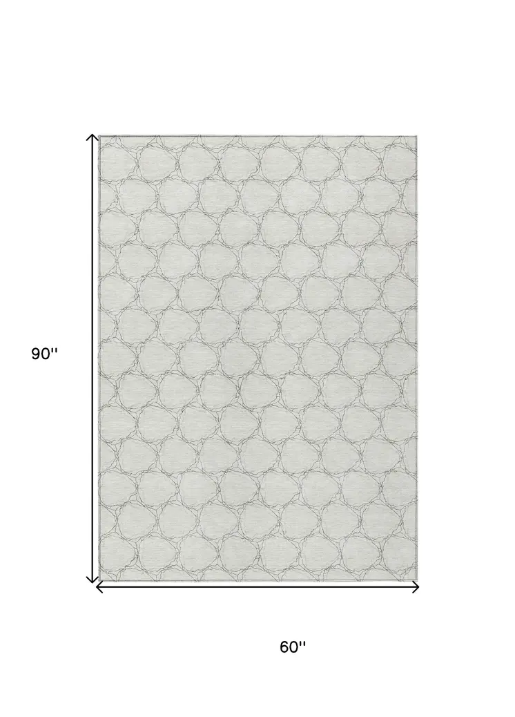 5' X 8' Ivory And Black Geometric Washable Indoor Outdoor Area Rug