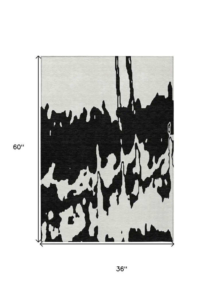 3' X 5' Black And Ivory Abstract Washable Indoor Outdoor Area Rug