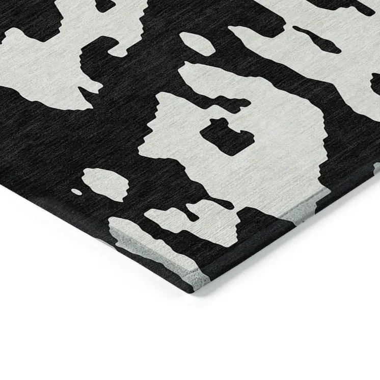 9' X 12' Black And Ivory Abstract Washable Indoor Outdoor Area Rug