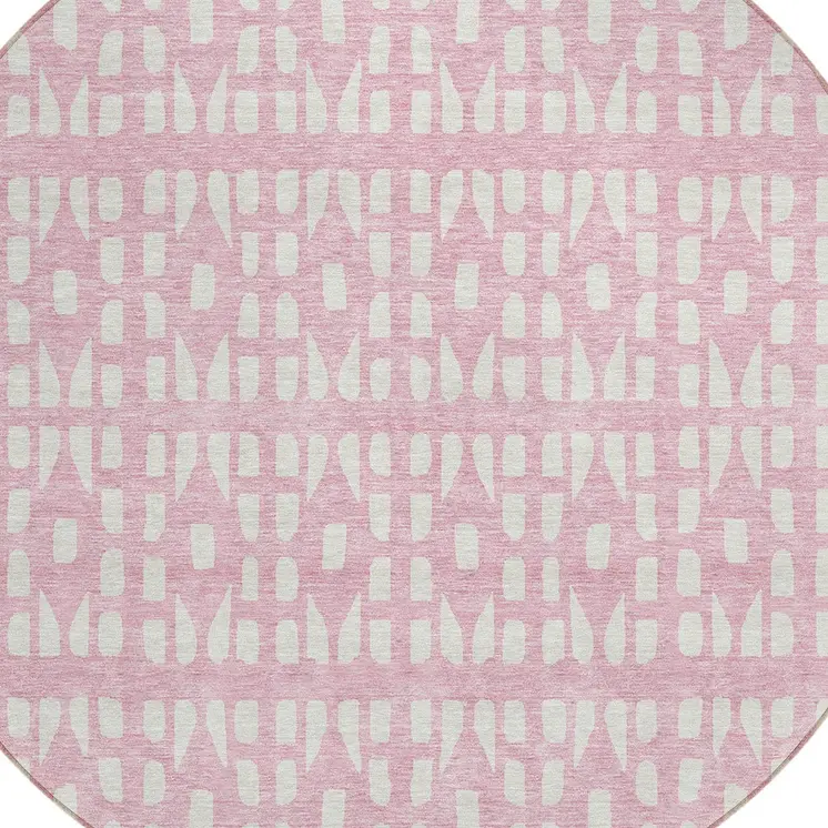 8' Pink And Ivory Round Geometric Washable Indoor Outdoor Area Rug