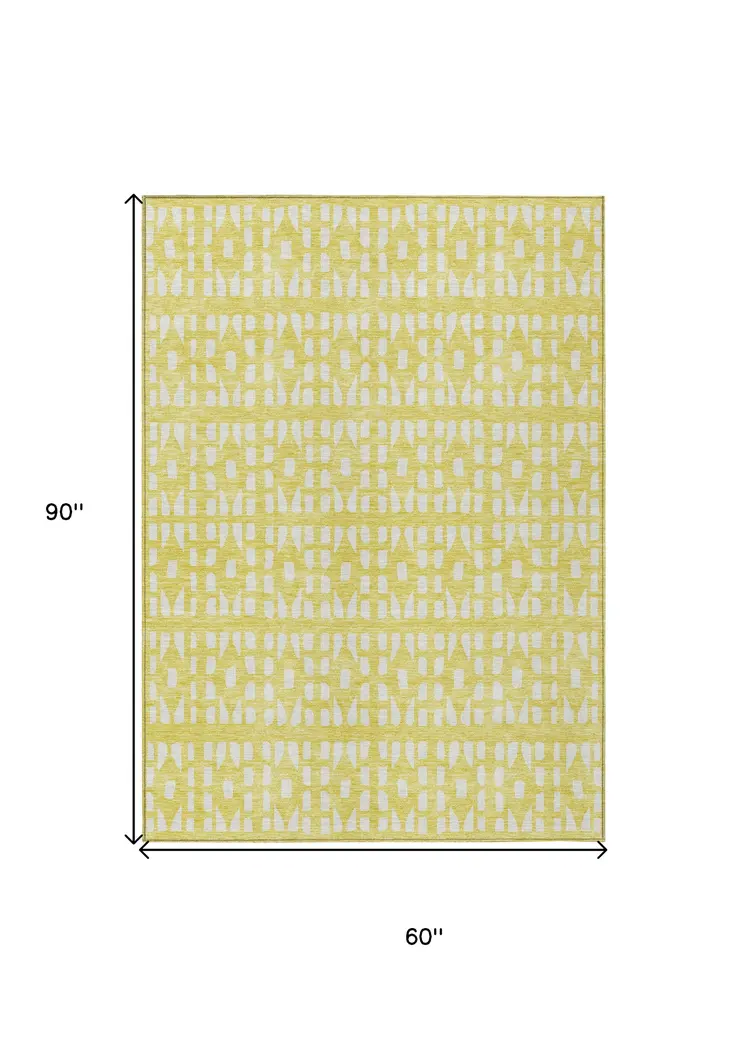 5' X 8' Yellow And Ivory Geometric Washable Indoor Outdoor Area Rug
