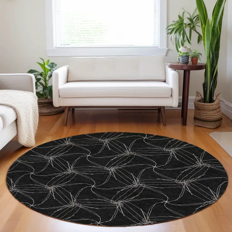 8' Black And Ivory Round Geometric Washable Indoor Outdoor Area Rug