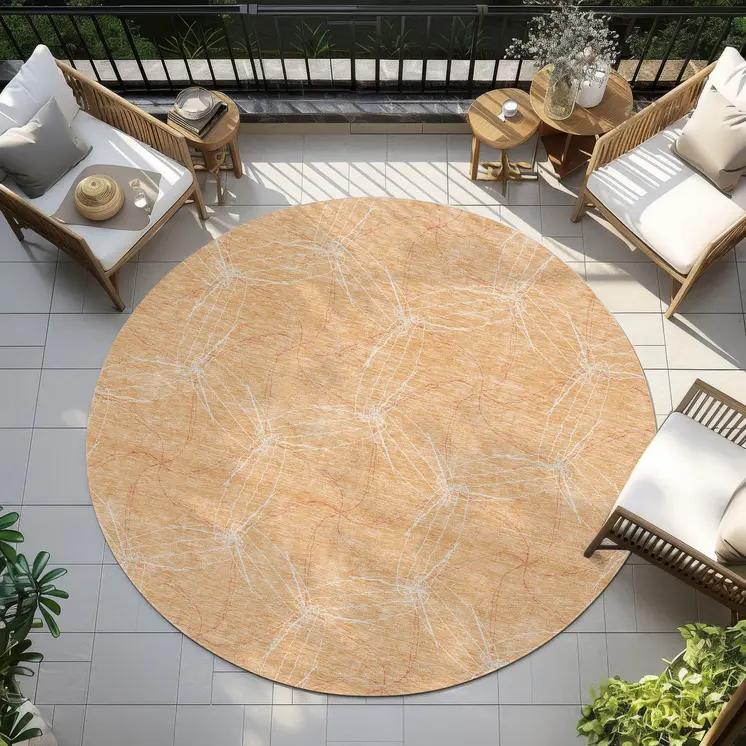 8' Peach And Ivory Round Geometric Washable Indoor Outdoor Area Rug