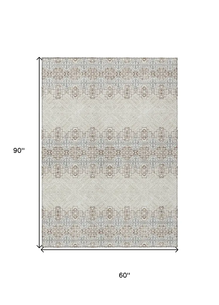 5' X 8' Ivory And Taupe Tribal Washable Indoor Outdoor Area Rug