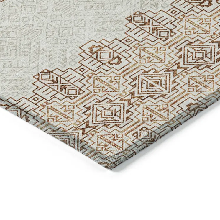 10' X 14' Orange And Ivory Tribal Washable Indoor Outdoor Area Rug