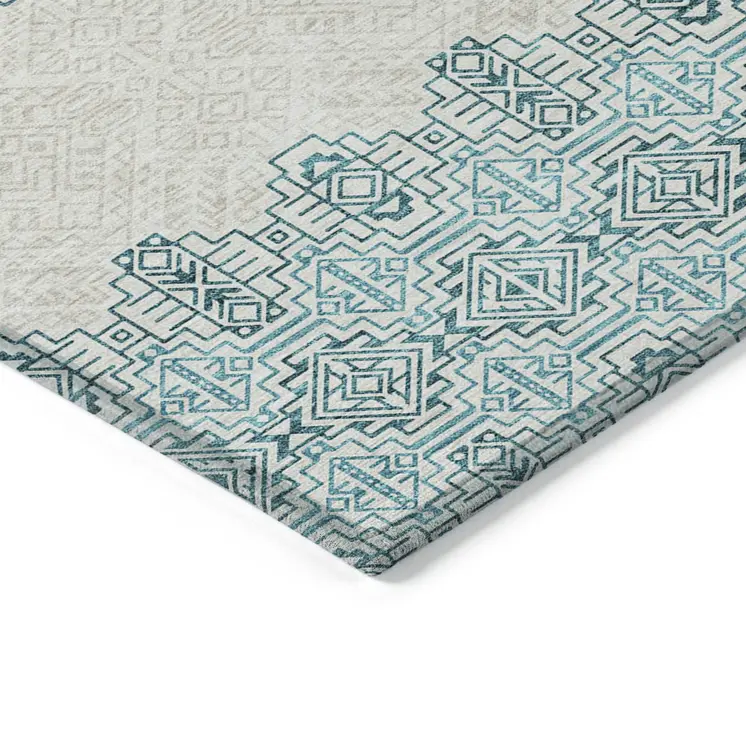5' X 8' Teal Blue And Ivory Tribal Washable Indoor Outdoor Area Rug