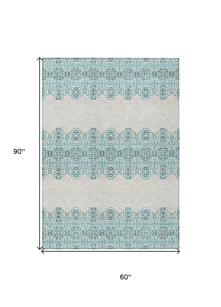 5' X 8' Teal Blue And Ivory Tribal Washable Indoor Outdoor Area Rug