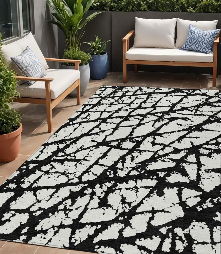 5' X 8' Black And Ivory Abstract Washable Indoor Outdoor Area Rug