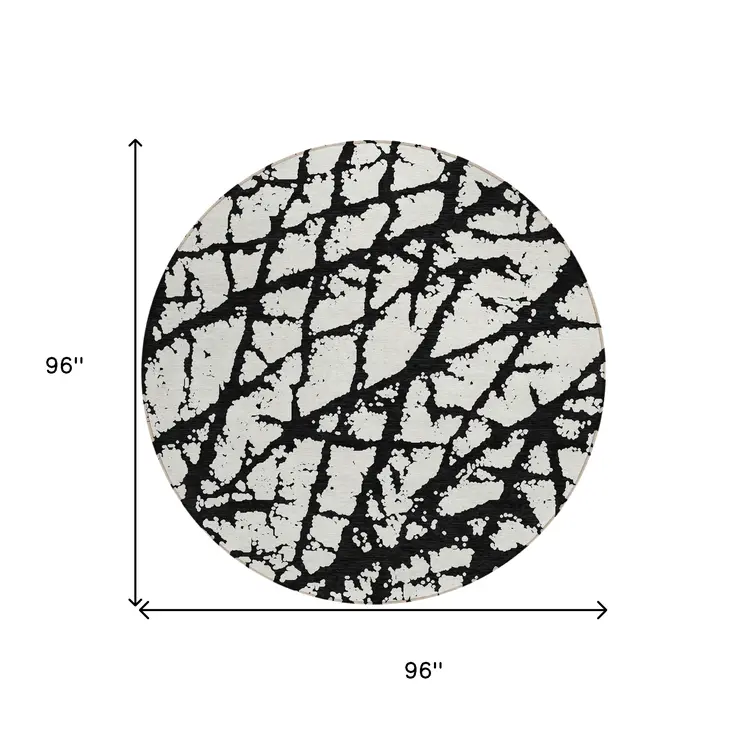 8' Black And Ivory Round Abstract Washable Indoor Outdoor Area Rug