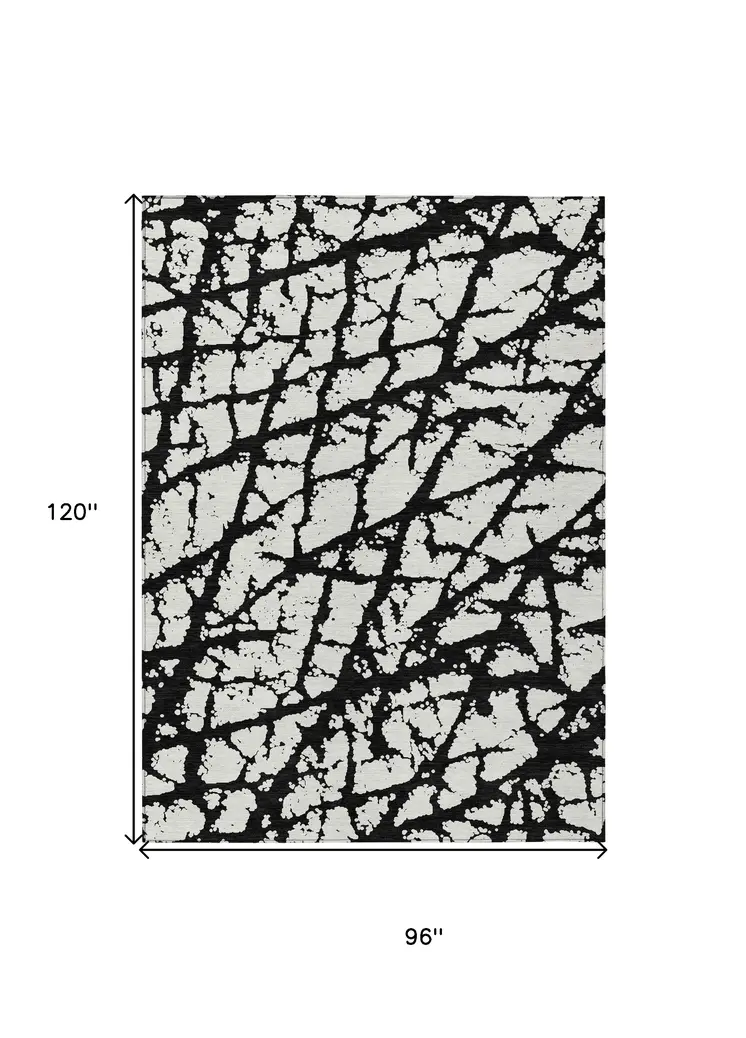 8' X 10' Black And Ivory Abstract Washable Indoor Outdoor Area Rug