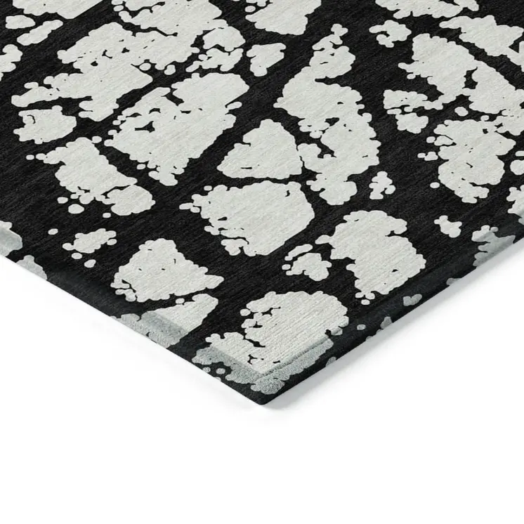 10' X 14' Black And Ivory Abstract Washable Indoor Outdoor Area Rug