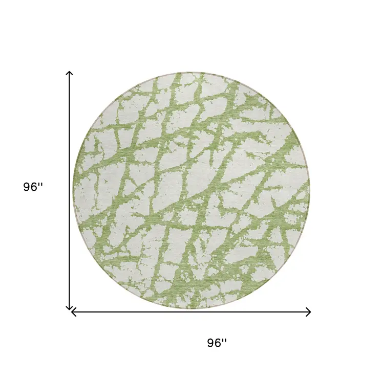 8' Green And Ivory Round Abstract Washable Indoor Outdoor Area Rug