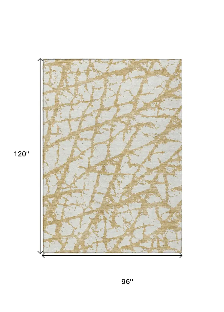 8' X 10' Gold And Ivory Abstract Washable Indoor Outdoor Area Rug