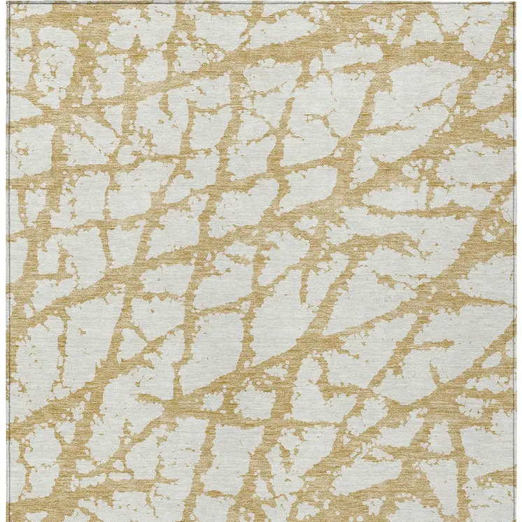 9' X 12' Gold And Ivory Abstract Washable Indoor Outdoor Area Rug
