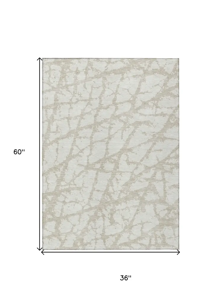 3' X 5' Ivory And Beige Abstract Washable Indoor Outdoor Area Rug