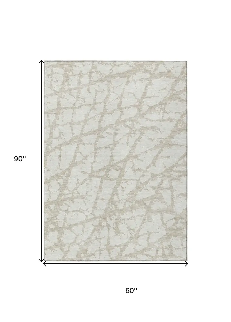 5' X 8' Ivory And Beige Abstract Washable Indoor Outdoor Area Rug