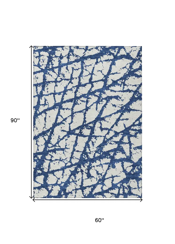 5' X 8' Navy Blue And Ivory Abstract Washable Indoor Outdoor Area Rug
