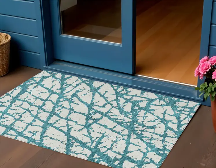 3' X 5' Teal Blue And Ivory Abstract Washable Indoor Outdoor Area Rug