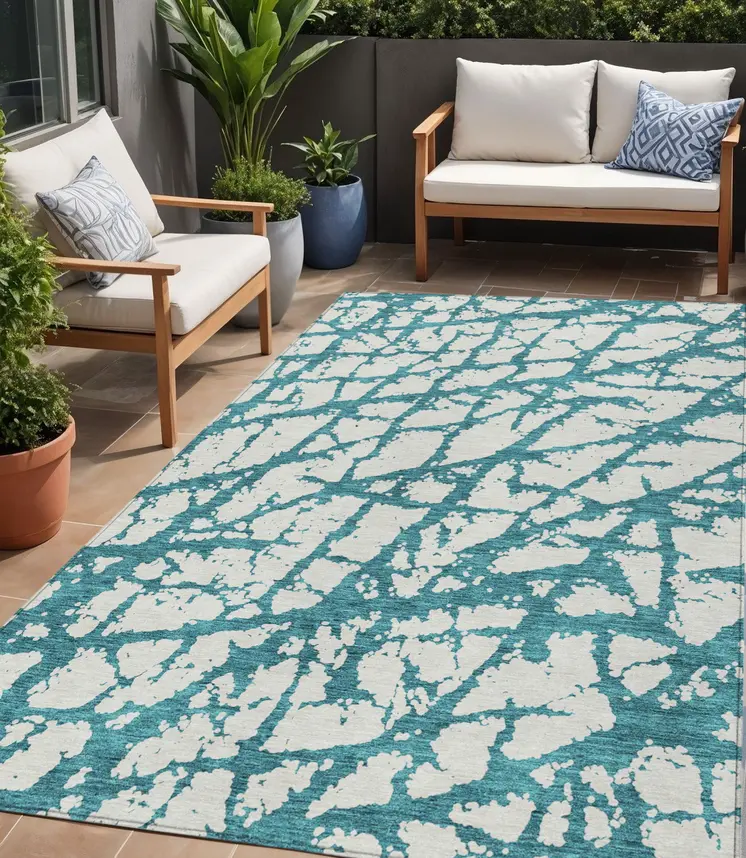 5' X 8' Teal Blue And Ivory Abstract Washable Indoor Outdoor Area Rug