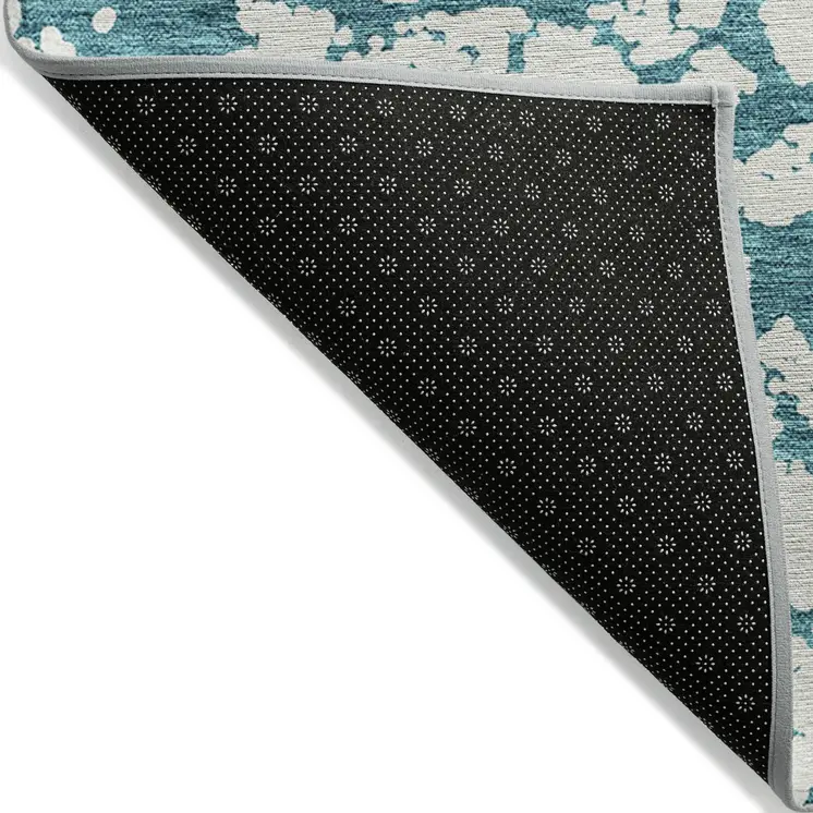 5' X 8' Teal Blue And Ivory Abstract Washable Indoor Outdoor Area Rug