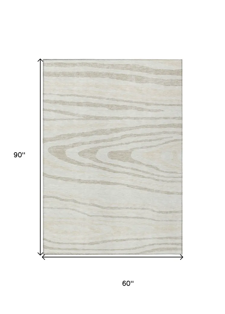 5' X 8' Ivory Beige And Taupe Faux Bois Washable Indoor Outdoor Area Rug