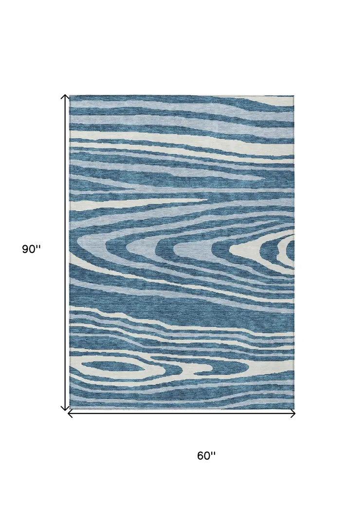 5' X 8' Navy Blue Denim Blue And Ivory Faux Bois Washable Indoor Outdoor Area Rug