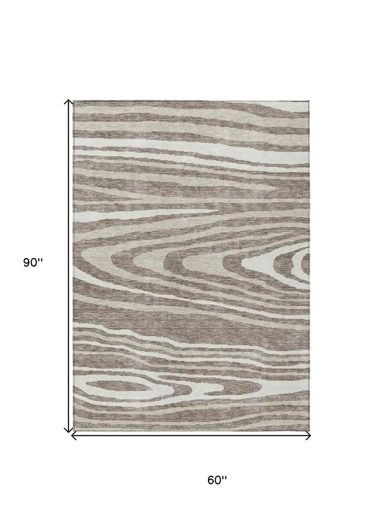 5' X 8' Taupe Ivory And Khaki Faux Bois Washable Indoor Outdoor Area Rug