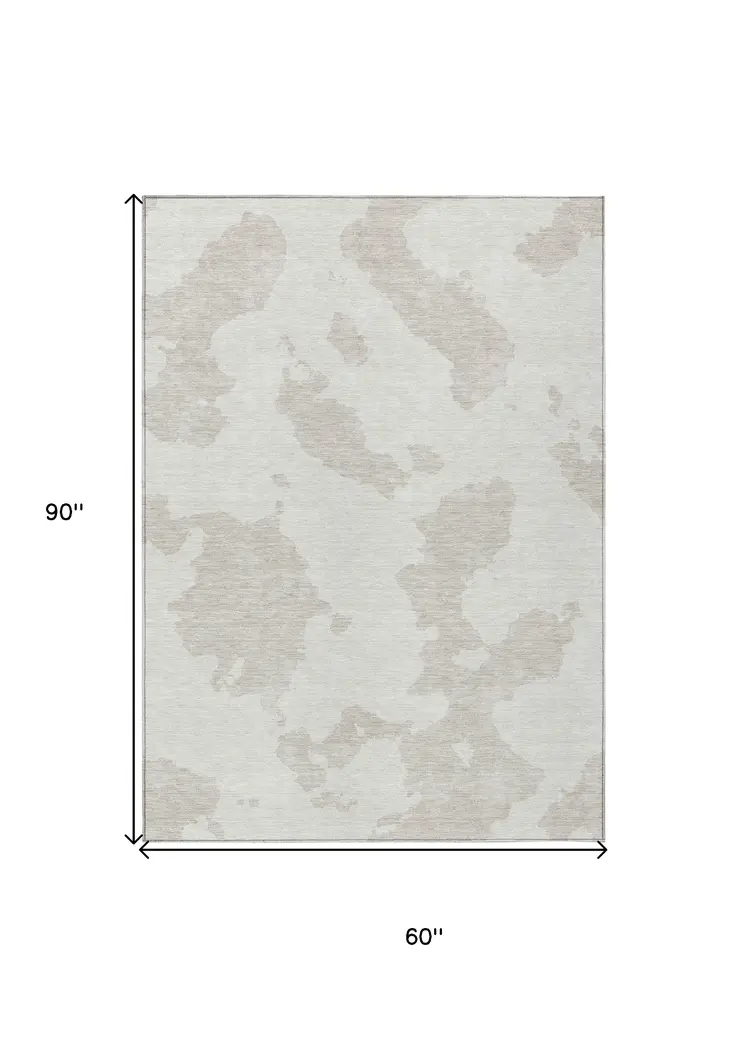 5' X 8' Ivory And Beige Abstract Washable Indoor Outdoor Area Rug