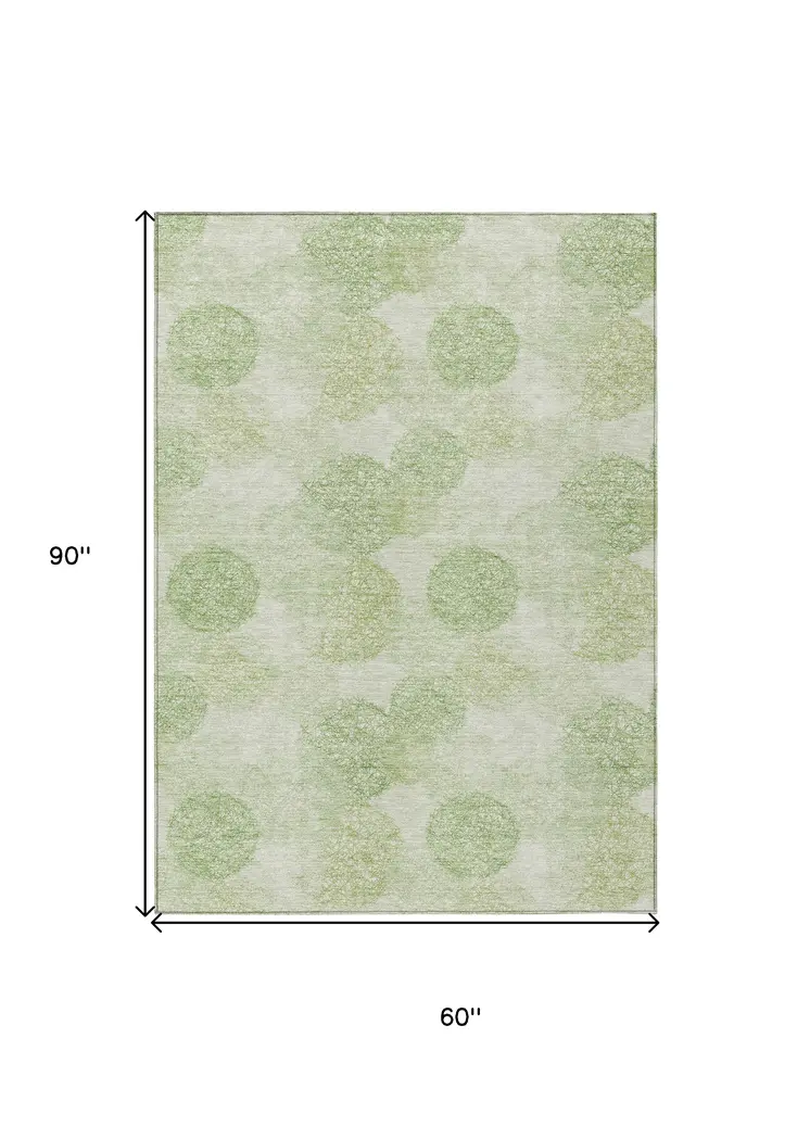 5' X 8' Sage Fern Green And Ivory Polka Dot Washable Indoor Outdoor Area Rug