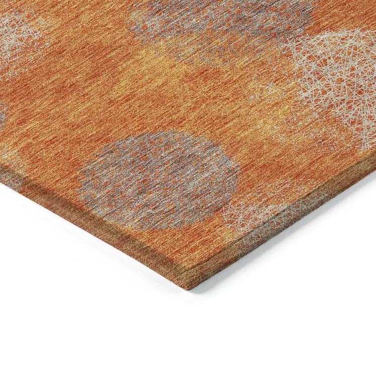 10' X 14' Orange Silver And Peach Polka Dot Washable Indoor Outdoor Area Rug