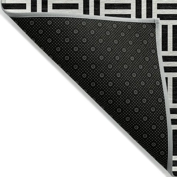 8' X 10' Black And Ivory Geometric Washable Indoor Outdoor Area Rug