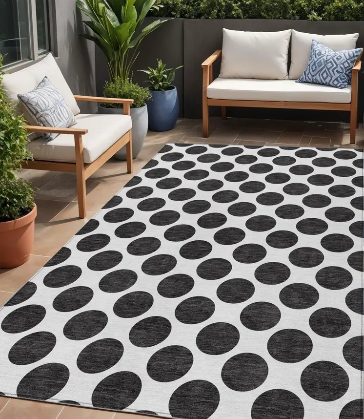 5' X 8' Black And Ivory Polka Dot Washable Indoor Outdoor Area Rug