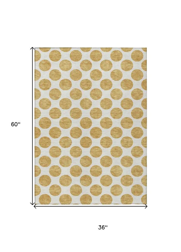 3' X 5' Gold And Ivory Polka Dot Washable Indoor Outdoor Area Rug