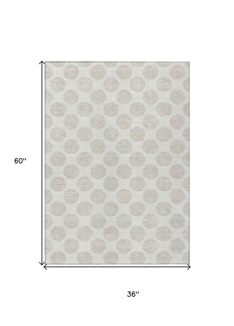3' X 5' Ivory And Beige Polka Dot Washable Indoor Outdoor Area Rug