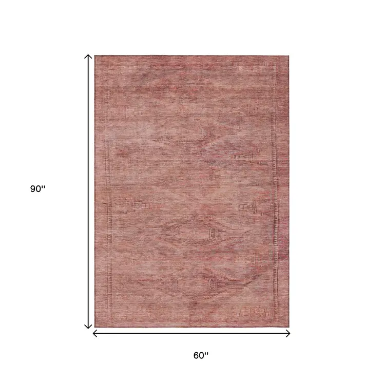 5' X 8' Terra Cotta And Salmon Aztec Washable Indoor Outdoor Area Rug