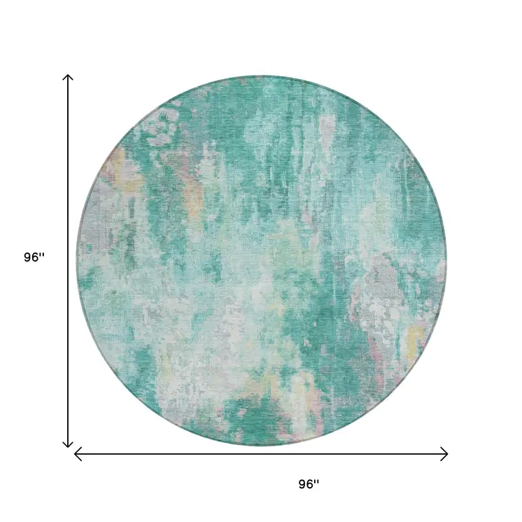8' Teal Blue Peach And Ivory Round Abstract Washable Indoor Outdoor Area Rug
