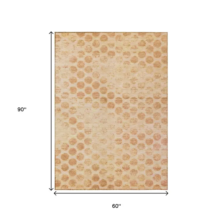 5' X 8' Peach And Rust Polka Dot Washable Indoor Outdoor Area Rug