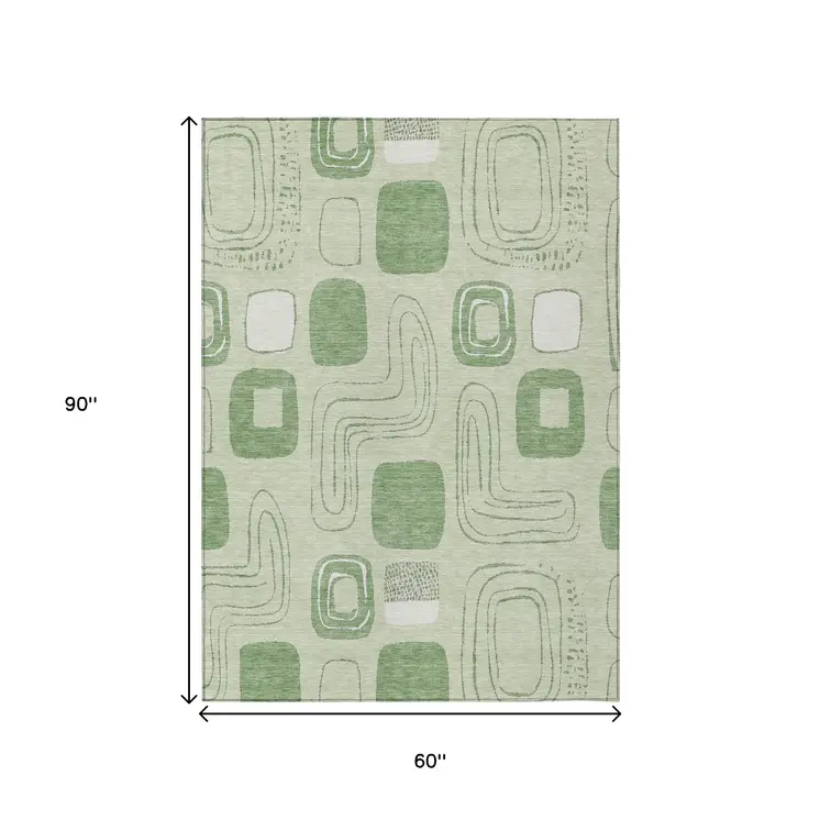 5' X 8' Mint Green And Ivory Geometric Washable Indoor Outdoor Area Rug