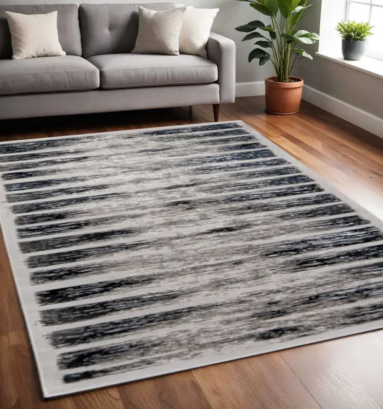 5' X 8' Gray And Black Abstract Distressed Area Rug