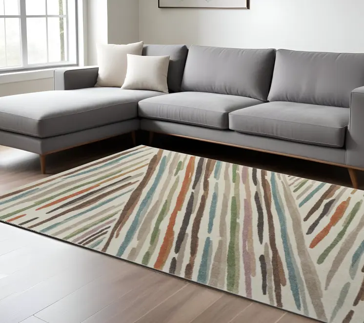 10' X 13' Ivory Brown And Blue Abstract Area Rug