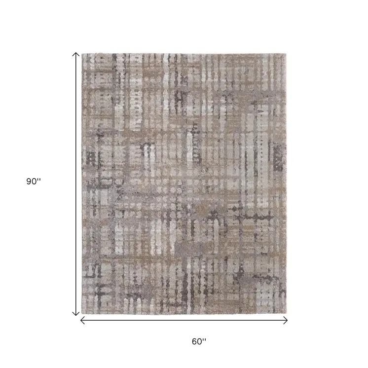 5' X 8' Brown Tan And Ivory Abstract Distressed Area Rug