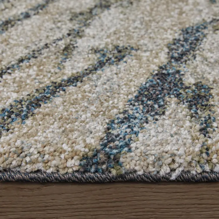 5' X 8' Gray Green And Ivory Abstract Area Rug
