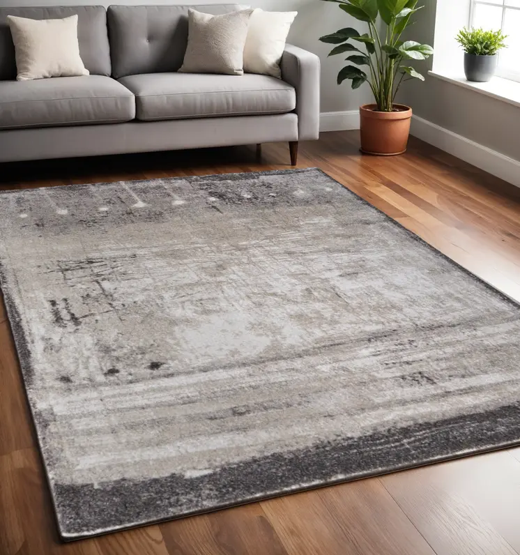 5' X 8' Gray Ivory And Taupe Abstract Distressed Area Rug