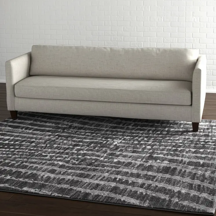 5' X 8' Black Gray And Ivory Abstract Area Rug